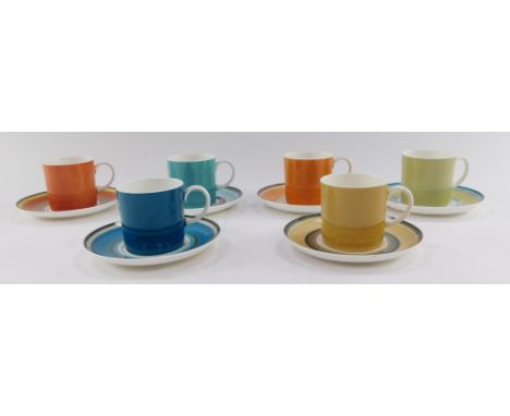 A set of six Susie Cooper for Wedgwood coffee cans and saucers. decorated in the Gay Stripes pattern, various colour ways, pr