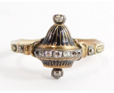 A Victorian memorial ring, the central domed section with row of tiny diamonds over the basket, with top and bottom diamond s