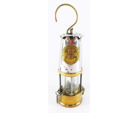 A Protector Lamp &amp; Lighting Co Ltd miner's safety lamp, type GR6S, numbered 3594, Eccles, 25cm high.