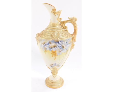 A Royal Worcester blush porcelain jug, circa 1895, of baluster form with heavily moulded scroll and mask detailing, painted i