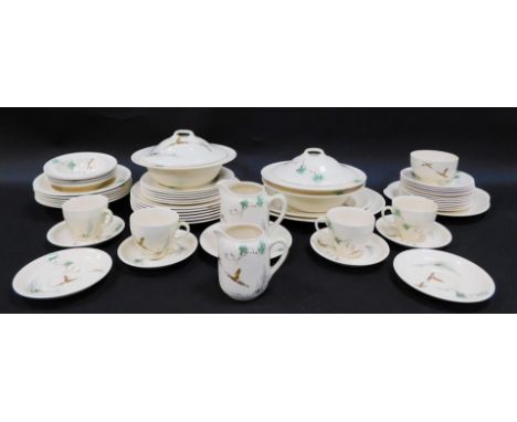 A Royal Doulton The Coppice pattern porcelain part dinner service, comprising four tea cups and saucers, milk jug, sugar bowl