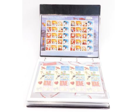 An album containing Royal Mail smilers, first day covers, Christmas, Glorious England, Commemorative flowers and others. (1 a