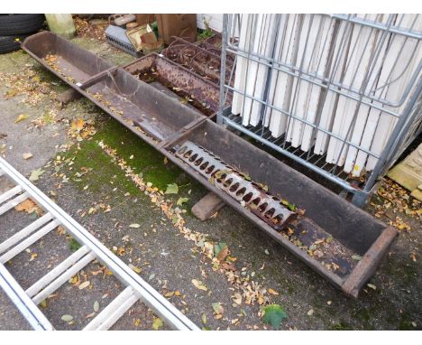 A wooden feeding trough, in three sections, 31cm deep, 275cm long. 
