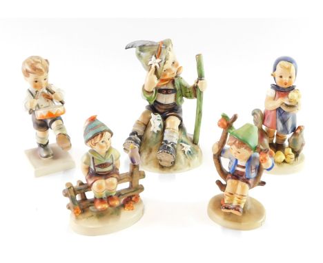 Five Goebel Hummel figures, to comprising Wayside Harmony., Little Drummer., Girl feeding hens., Apple Tree Boy., and a seate