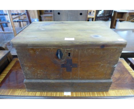 A pine fitted first aid box