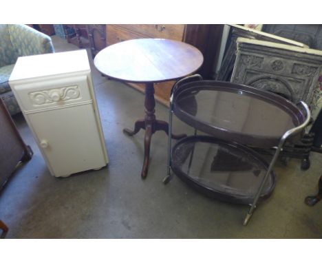 An Art Deco trolley, bedside table and an oak and mahogany tripod table