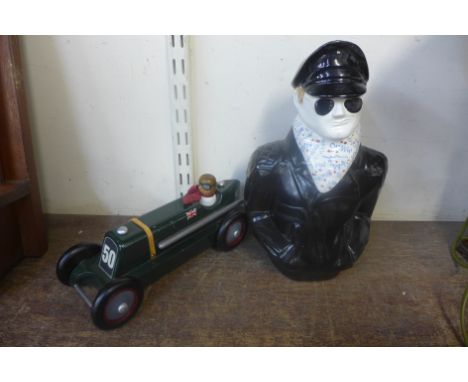 A Ryk Heuff limited edition wooden car and a Swineside ceramic lidded jar