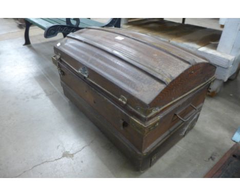 A tin steamer trunk
