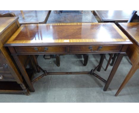 An inlaid mahogany two drawer console table