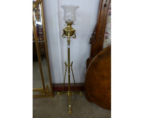 An Art Nouveau brass telescopic standard oil lamp