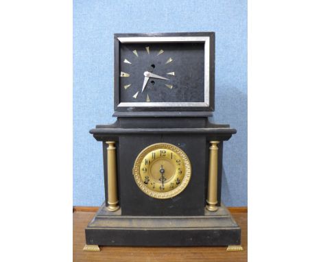 An early 20th Century oak mantel clock, faux slate mantel clock and two others