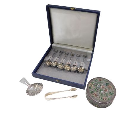A George VI silver caddy spoon, Birmingham 1951, silver hallmarked sugar tongs, a cased set of six coffee spoons, marked Mesk