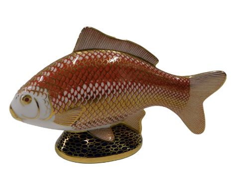 A Royal Crown Derby fish paperweight, gold button to underside.
