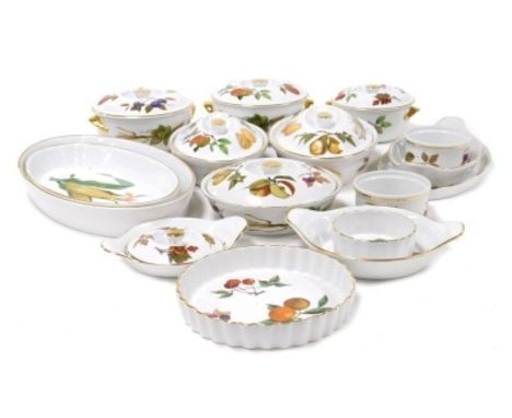 A group of Royal Worcester Evesham pattern oven to table wares, including tureens and covers, flan dish, souffle dishes and s