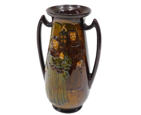A Royal Doulton kingsware two handled vase, decorated with a figure holding keys, another with a lamp, printed marks to under