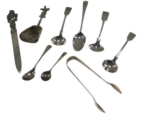 A collection of white metal and silver spoons, etc., to include a Dutch caddy spoon with windmill handle, sugar tongs, etc., 