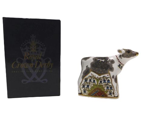 A Royal Crown Derby Bluebell Calf paperweight, printed marks in red to underside, gold button.