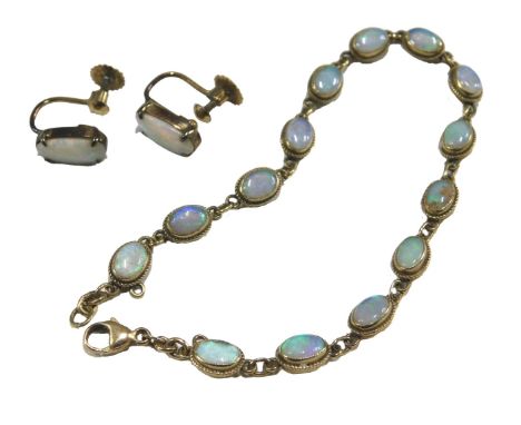 An opal bracelet, with chain links, on a lobster claw clasp, stamped 9ct, together with a pair of opal earrings, with screw f