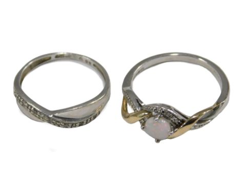A 9ct gold silver opal and diamond ring, in a crossover design, size N, together with a 9ct white gold and diamond ring, in a