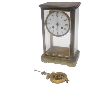 A late 19thC French brass four glass mantel clock, the enamel dial with Roman numerals, 25cm high.