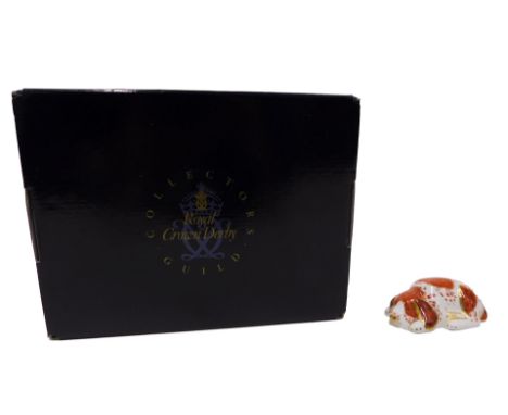 A Royal Crown Derby Collector's Guild paperweight Puppy, gold button to underside, boxed.