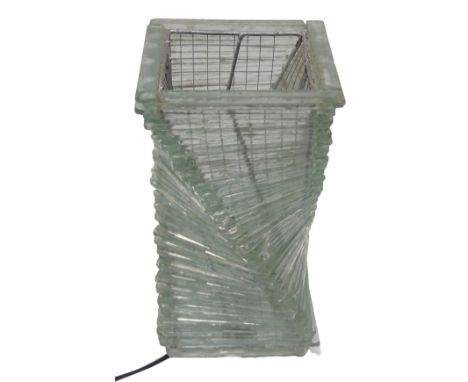 A clear glass sectional table lamp, with silvered fittings, 30cm high.
