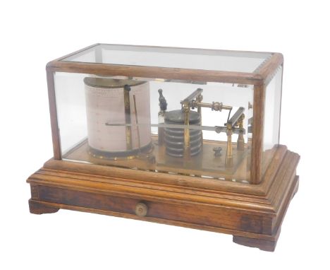A brass barograph, in glazed oak case with drawer, 36cm wide.