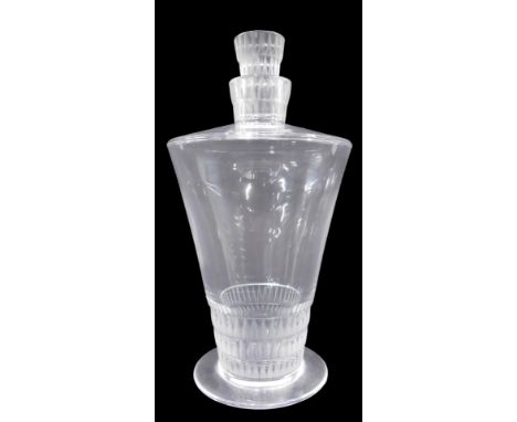 A Lalique Art Deco style decanter and stopper, the stopper, neck and base decorated with a design of rows of arches, engraved