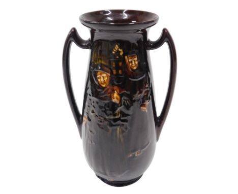 A Royal Doulton kingsware two handled vase, decorated with a monk and a man with a lantern, 28cm high.