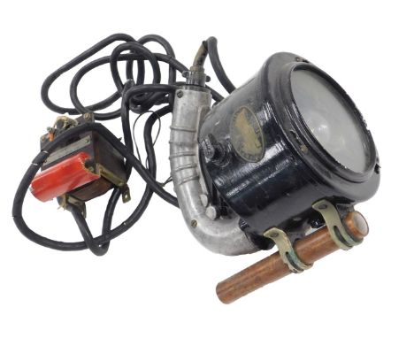 An Aldis signalling lamp, serial number 215909.