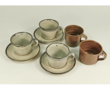 LEACH POTTERY Three breakfast cups &amp; saucers (one with crack) &amp; two cups. All with Pottery marks.