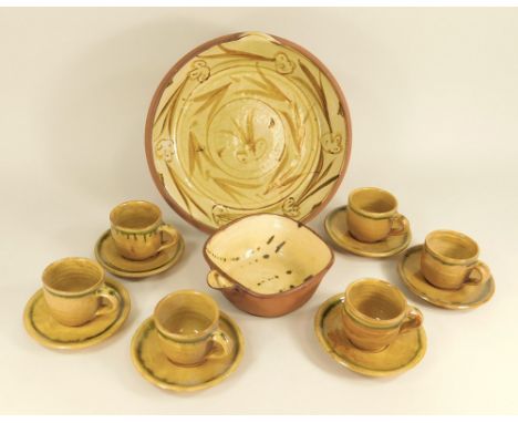 AMENDMENT TO CATALOGUE: CLIVE BOWEN ETC.Six slipware coffee cups &amp; saucers, by Clive Bowen, a pouring bowl, by Andrew Mar