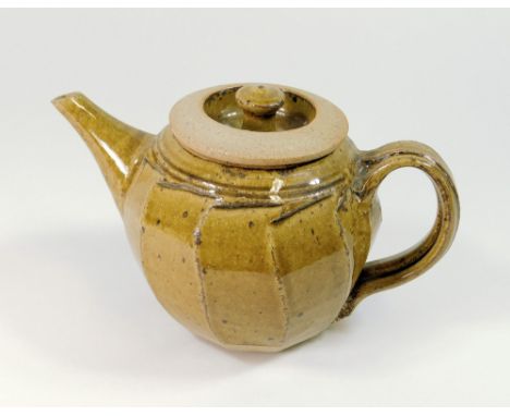 RICHARD BATTERHAM. A cut-sided teapot. Width 22cm.