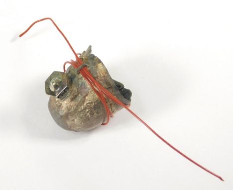 FINGER PRINT PIN. A finger print pin in silver &amp; red tiger wire. The fixing is removable to allow the pin to be worn on c