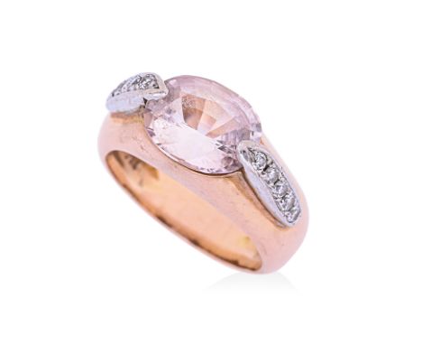 A PINK SAPPHIRE AND DIAMOND RING
Featuring an oval sapphire of light pink colour, weighing approximately 2.00 Cts, mounted in