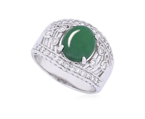 A TYPE A JADEITE CABOCHON AND DIAMOND RING
Featuring a green type a jadeite measuring approximately 9.25 x 7.65mm, mounted in