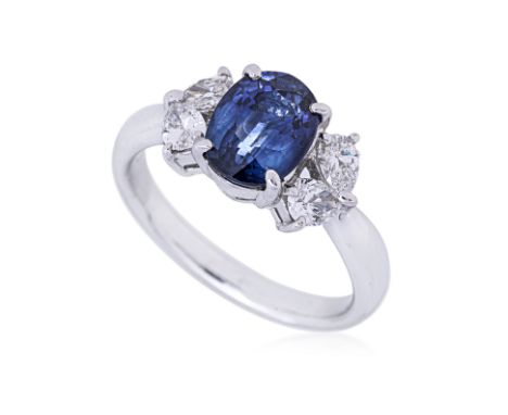 A SAPPHIRE AND DIAMOND RING
Featuring an oval cut sapphire weighing approximately 2.00 Cts, mounted in a platinum setting mar
