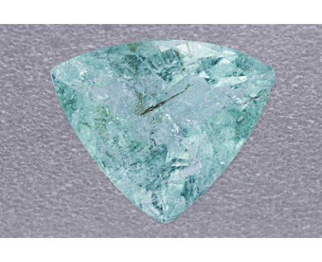 A TRIANGULAR LOOSE TOURMALINE Featuring a triangular tourmaline weighing approximately 3.90 Cts, of a light green colour, wit