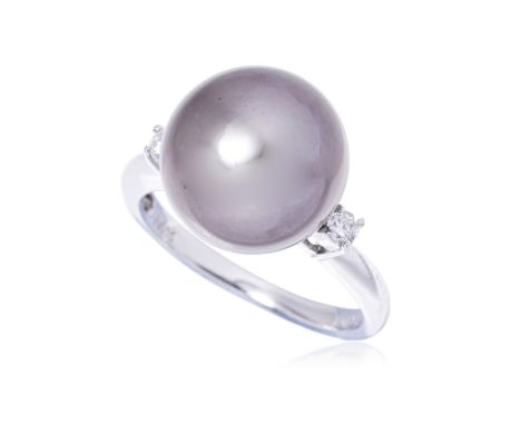 A CULTURED TAHITIAN PEARL AND DIAMOND RING Featuring a cultured Tahitian pearl measuring approximately 12mm, mounted in a pla