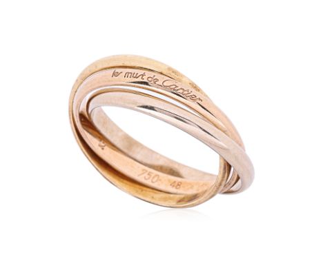 A LES MUST DE CARTIER TRINITY RING Comprised of three interlinked gold bands, signed and numbered, marked '750' US 4.5 3.55g 