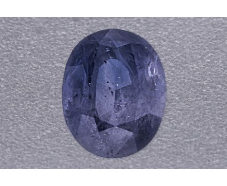 AN OVAL COLOUR CHANGE LOOSE SAPPHIRE Featuring an oval cut sapphire weighing approximately 2.73 Cts, with eye visible inclusi
