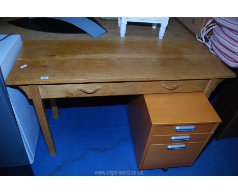 A bespoke cabinet maker made light Oak two-drawer side table, the drawer fronts meticulously made being intricately cut out o