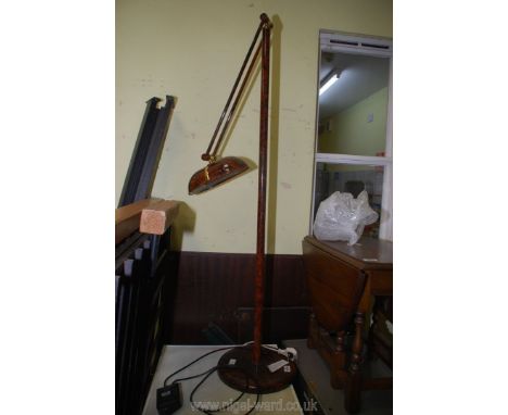 An adjustable floor light.
