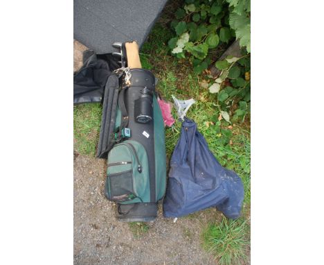 A golf caddy, bag and mixed clubs.