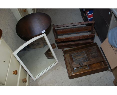 A wooden table, mirror, magazine rack etc.