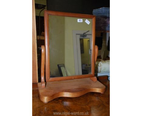 A swing mirror.
