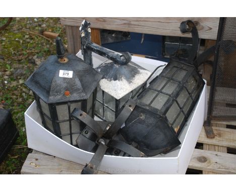 Three exterior wall lights plus bracket.