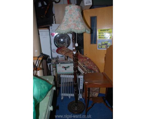 A standard lamp and shade.