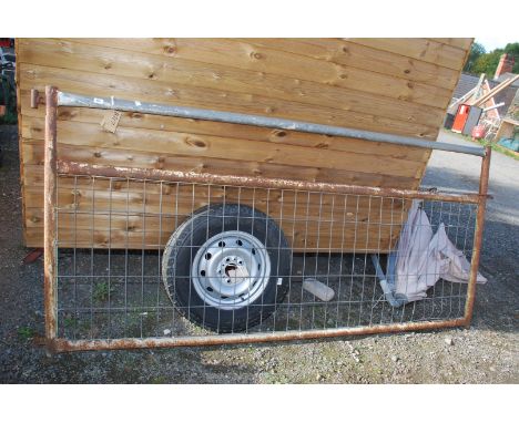 A metal farm gate. 
