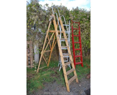 A wooden seven rung step ladder.